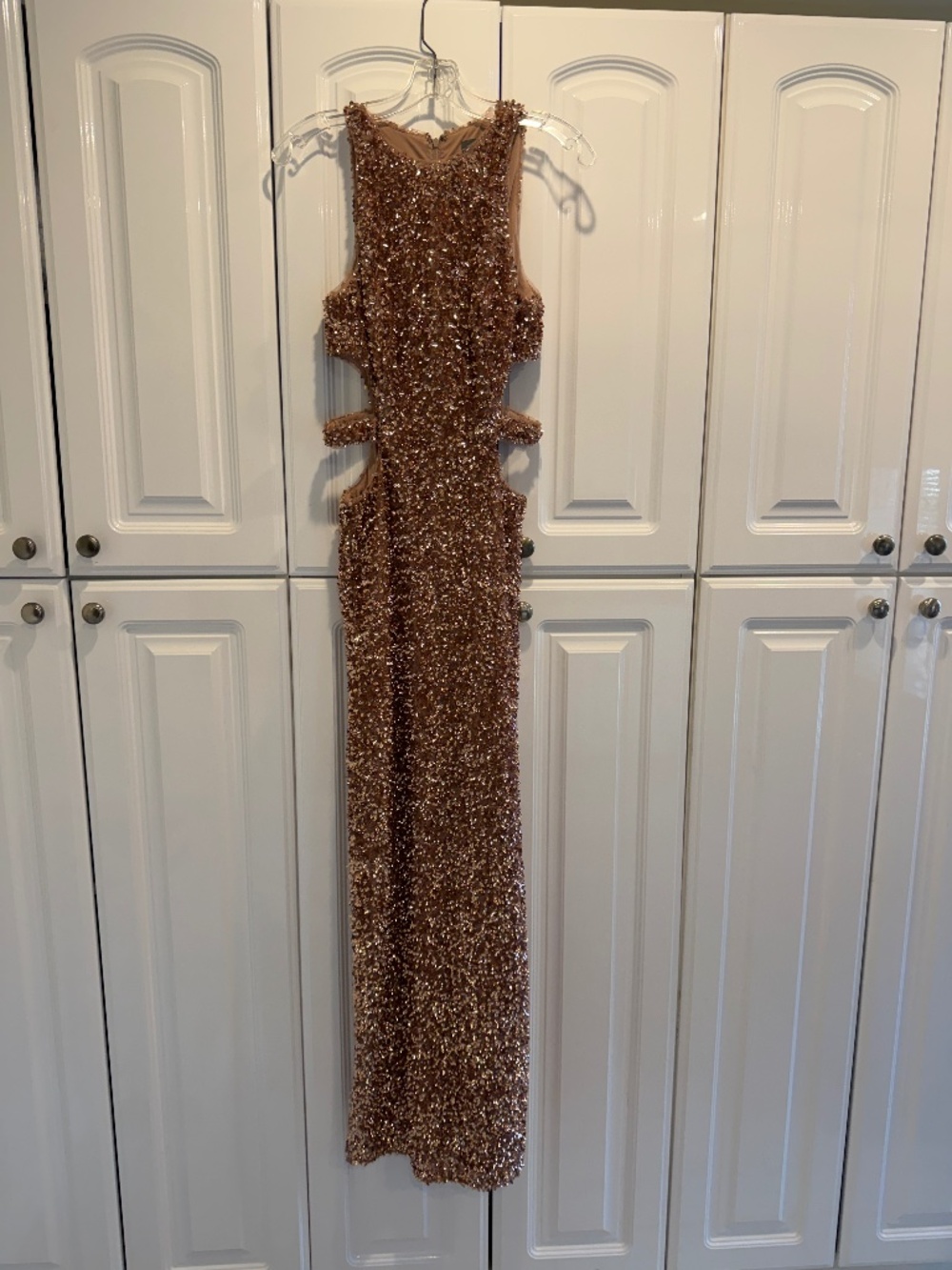 Liv Foster sequined rose colored gown